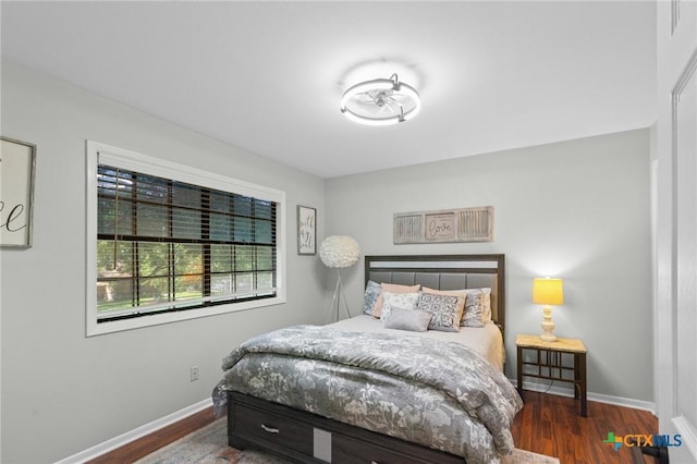 504 Masters Dr, Victoria, TX 77904 - bedroom featuring wood finished floors and baseboards
