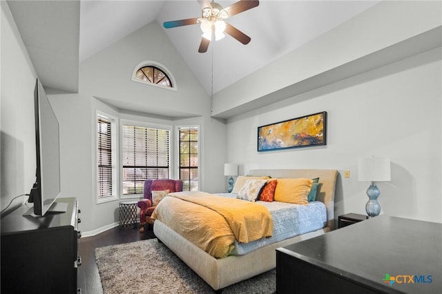 504 Masters Dr, Victoria, TX 77904 - bedroom featuring high vaulted ceiling, multiple windows, dark wood-style flooring, and ceiling fan