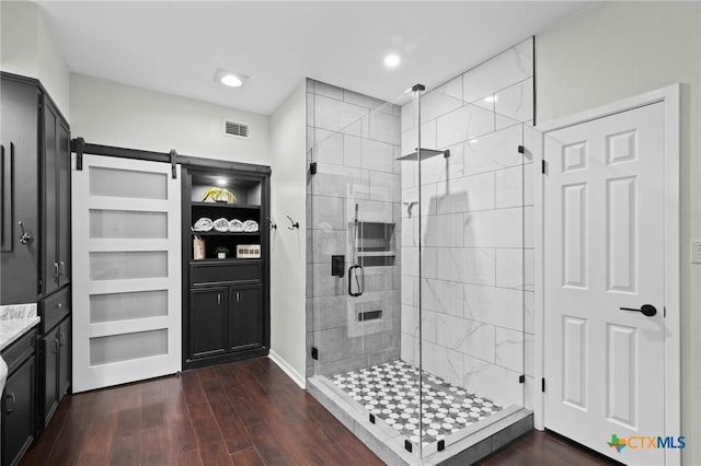 504 Masters Dr, Victoria, TX 77904 - full bath with a shower stall, wood finished floors, vanity, and recessed lighting