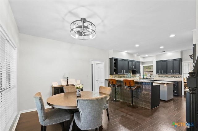 504 Masters Dr, Victoria, TX 77904 - dining area featuring dark wood finished floors, recessed lighting, and a chandelier