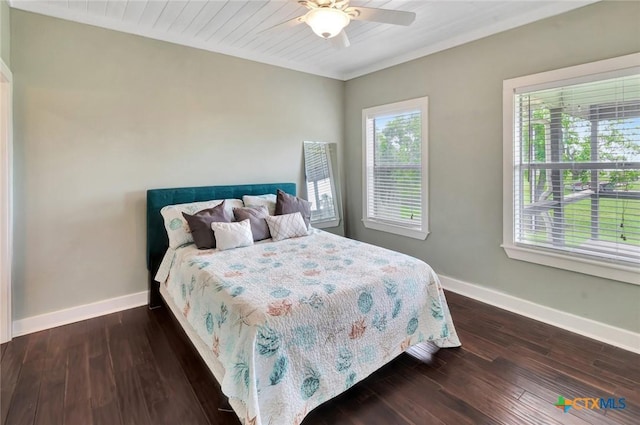 11 Enchanted Ln, Port Lavaca, TX 77979 - bedroom with dark wood-style flooring and a ceiling fan
