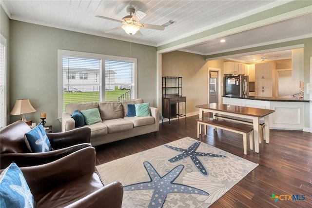 11 Enchanted Ln, Port Lavaca, TX 77979 - living area with a ceiling fan, dark wood-type flooring, and crown molding