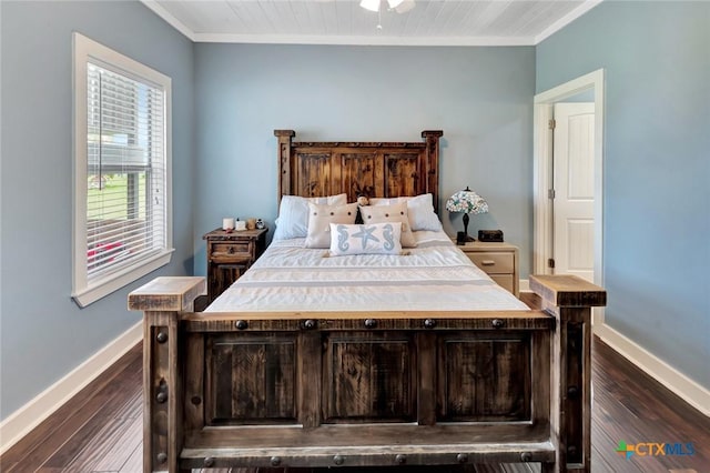 11 Enchanted Ln, Port Lavaca, TX 77979 - bedroom with ornamental molding and dark wood-style flooring