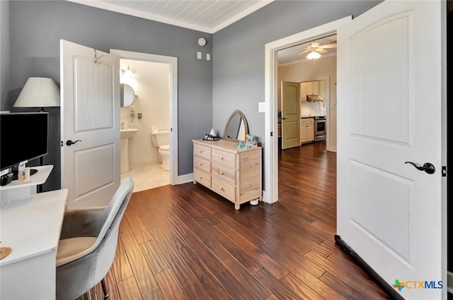 11 Enchanted Ln, Port Lavaca, TX 77979 - office area with ornamental molding, dark wood finished floors, and a ceiling fan