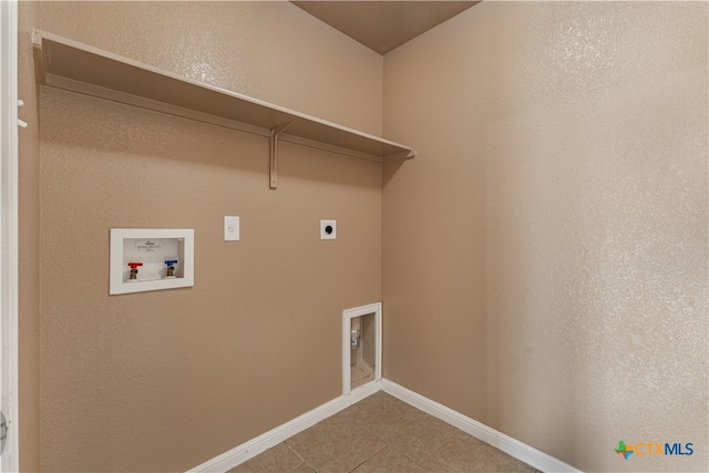 laundry area featuring washer hookup, electric dryer hookup, and tile patterned floors