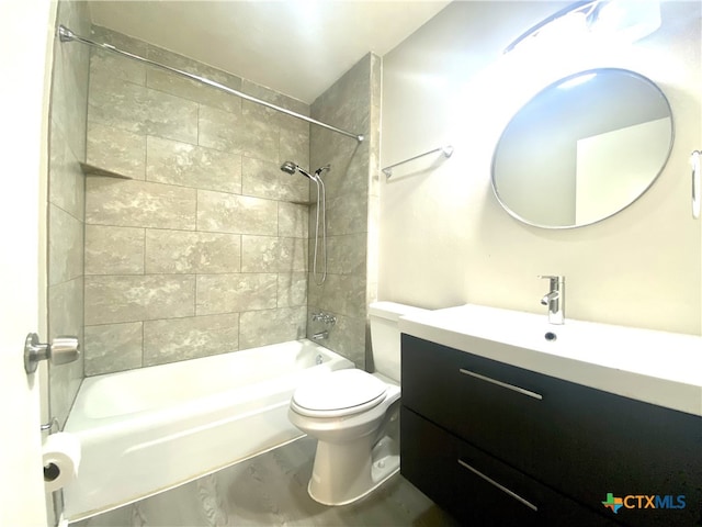 full bathroom featuring hardwood / wood-style flooring, vanity, toilet, and tiled shower / bath