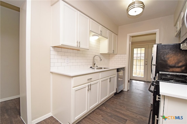 kitchen with sink, white cabinets, dark wood-type flooring, black gas stove, and dishwasher