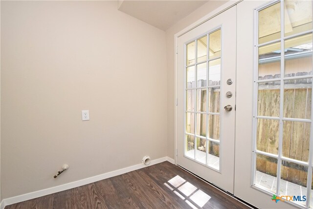 doorway featuring dark hardwood / wood-style floors and french doors