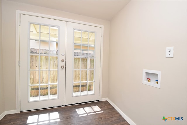 entryway featuring dark wood-type flooring, a healthy amount of sunlight, and french doors