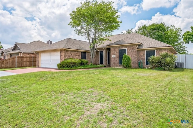 4803 Chad Dr, Killeen, TX 76542 - ranch-style house featuring fence, brick siding, a garage, cooling unit, and concrete driveway