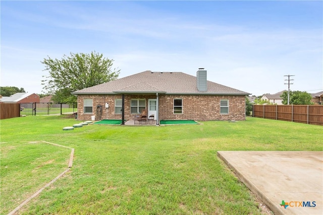 127 Ariana Ct, Killeen, TX 76542 - rear view of property featuring a patio area, a fenced backyard, and brick siding