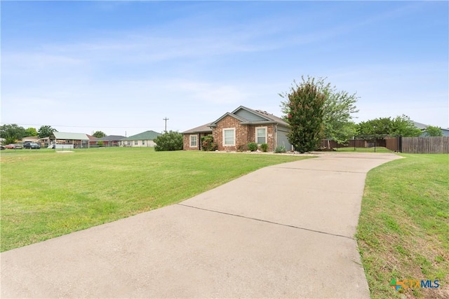 127 Ariana Ct, Killeen, TX 76542 - ranch-style home with brick siding and driveway