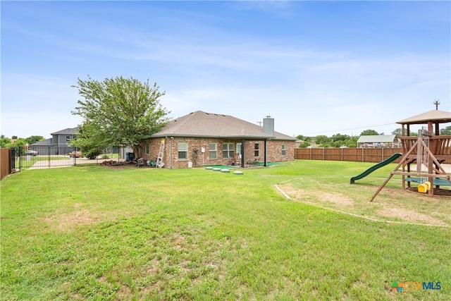 127 Ariana Ct, Killeen, TX 76542 - fenced backyard with a playground