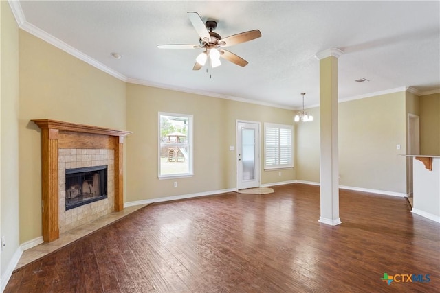 127 Ariana Ct, Killeen, TX 76542 - unfurnished living room with healthy amount of natural light, wood finished floors, ornate columns, and ornamental molding