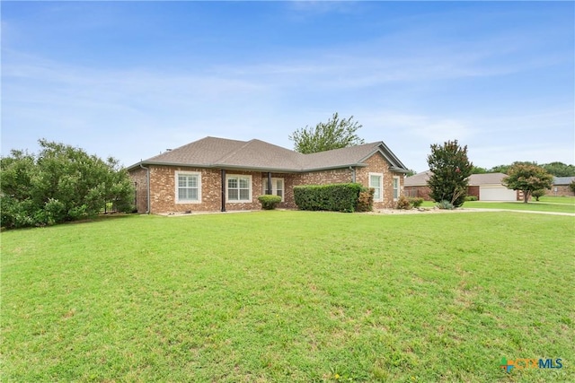 127 Ariana Ct, Killeen, TX 76542 - ranch-style home with a front yard and brick siding