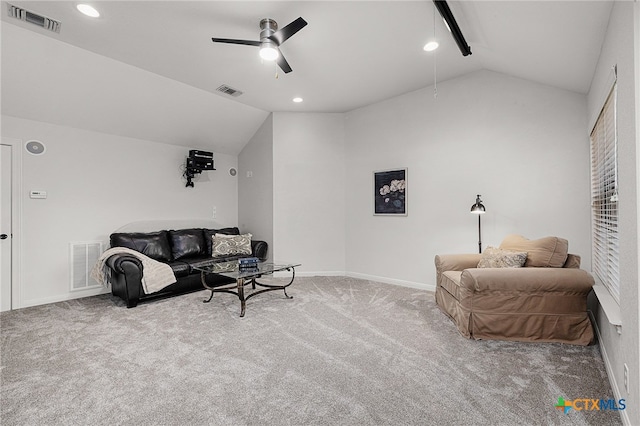 living area with carpet flooring, ceiling fan, and lofted ceiling