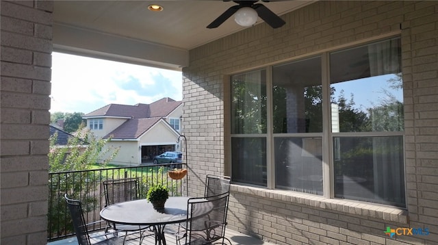 balcony featuring ceiling fan