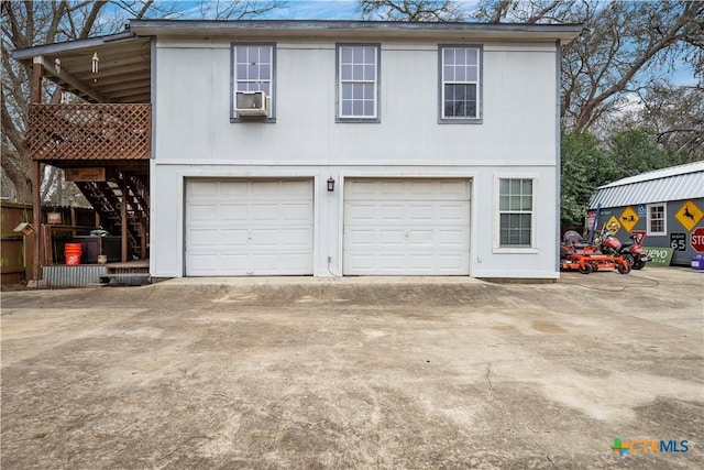 garage with driveway