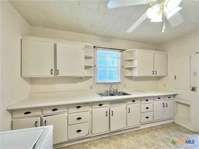 1015 N 3rd St, Temple, TX 76501 - kitchen with open shelves, light countertops, white cabinetry, and ceiling fan