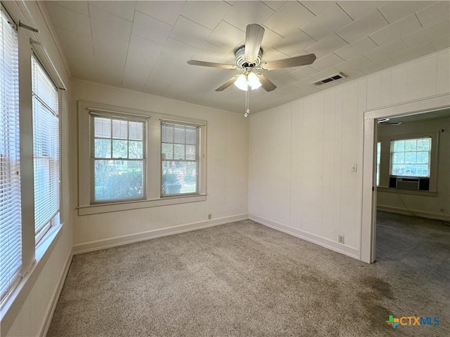 1015 N 3rd St, Temple, TX 76501 - carpeted spare room with healthy amount of natural light, ceiling fan, and cooling unit