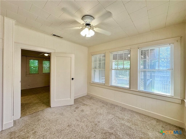 1015 N 3rd St, Temple, TX 76501 - empty room featuring a ceiling fan and light colored carpet