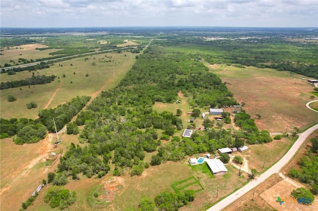 birds eye view of property featuring a rural view