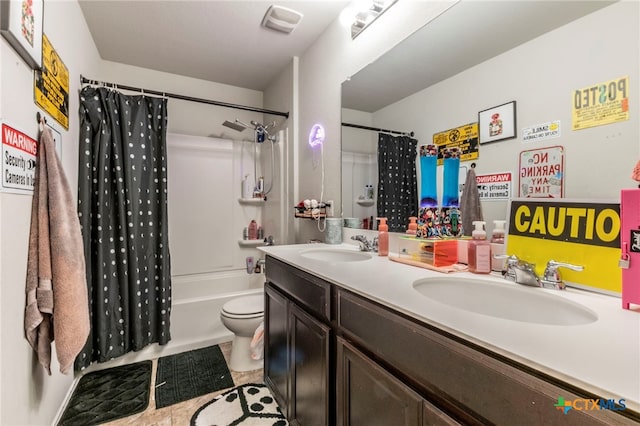 8907 Misty Pine Dr, Temple, TX 76502 - bathroom featuring double vanity, shower / bath combo with shower curtain, and tile patterned flooring