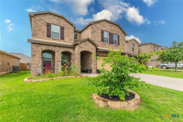8907 Misty Pine Dr, Temple, TX 76502 - view of front facade with brick siding and a front yard