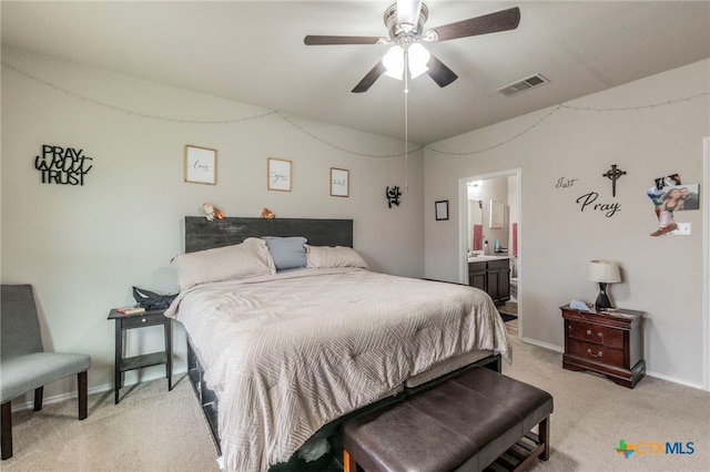 8907 Misty Pine Dr, Temple, TX 76502 - bedroom with light colored carpet, ceiling fan, and ensuite bath