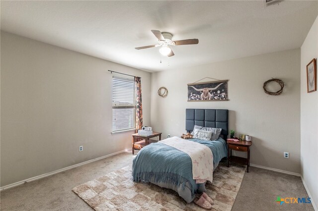 8907 Misty Pine Dr, Temple, TX 76502 - carpeted bedroom with baseboards and ceiling fan