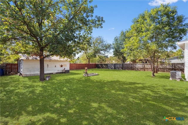 view of yard featuring central AC unit