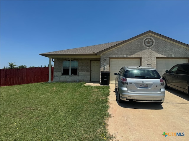 ranch-style house with a front lawn and a garage