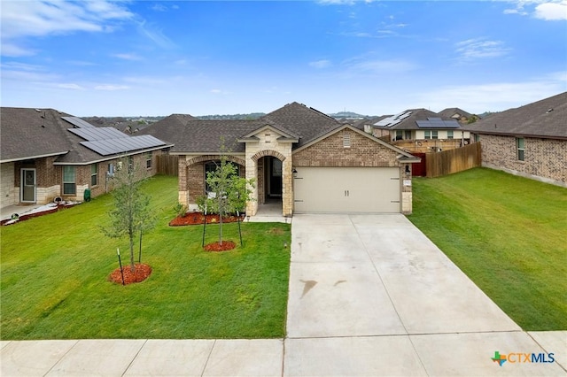 2512 Corradino St, Harker Heights, TX 76548 - french country home with brick siding, an attached garage, driveway, roof with shingles, and a residential view