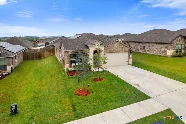 2512 Corradino St, Harker Heights, TX 76548 - french country inspired facade featuring driveway, an attached garage, a residential view, a shingled roof, and brick siding
