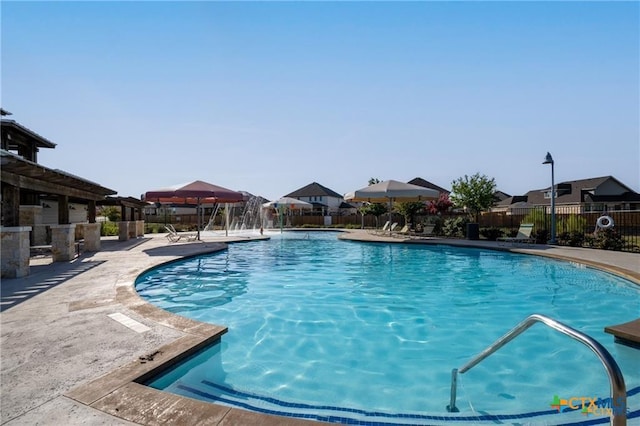 2512 Corradino St, Harker Heights, TX 76548 - community pool with fence, a gazebo, a patio, and a residential view