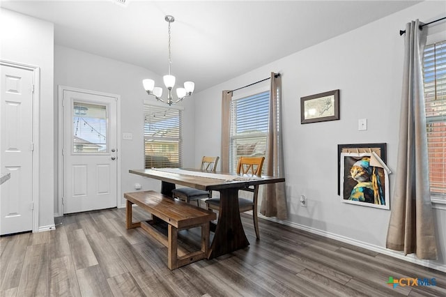 2512 Corradino St, Harker Heights, TX 76548 - dining room with wood finished floors, a chandelier, plenty of natural light, baseboards, and lofted ceiling