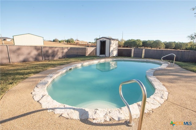 view of swimming pool featuring a storage unit