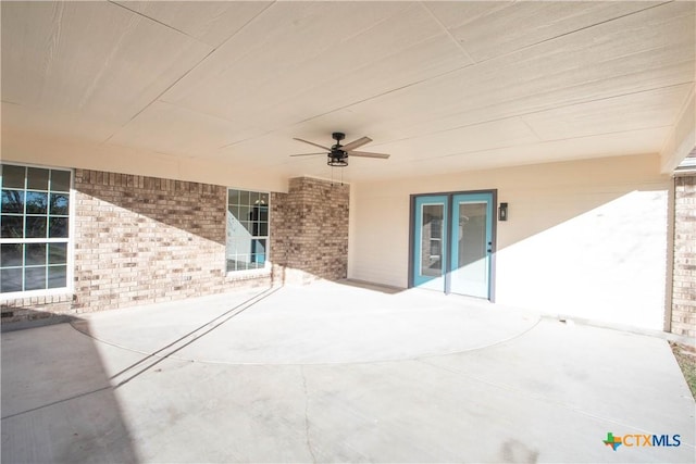 view of patio featuring ceiling fan