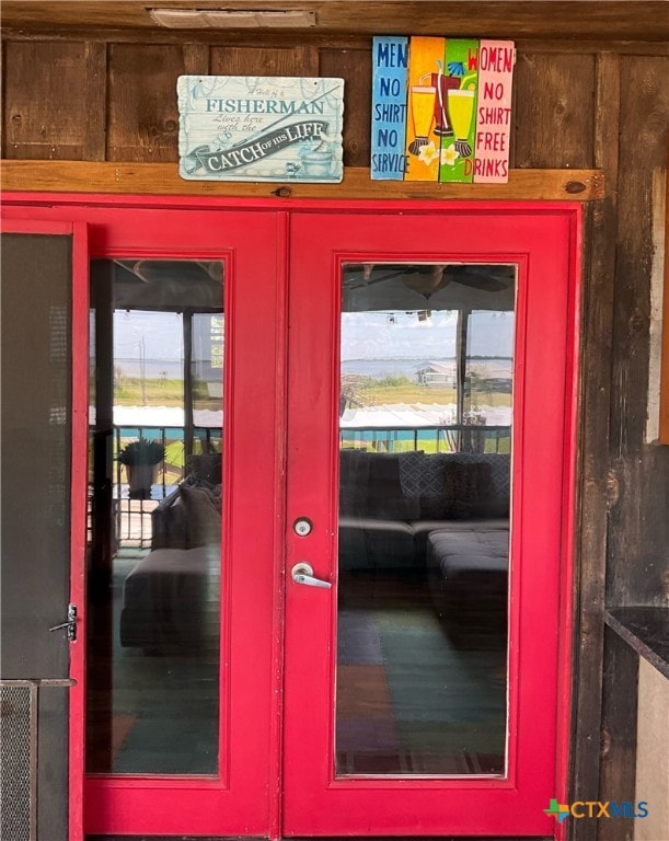 property entrance featuring french doors