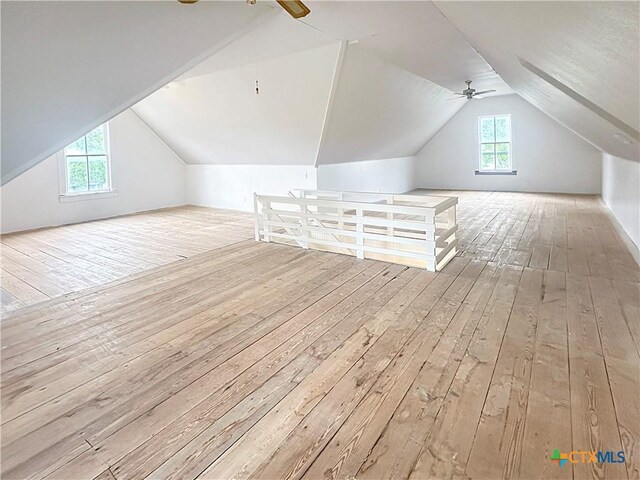 307 N Pecan St, Moulton, TX 77975 - bonus room with wood-type flooring, ceiling fan, and vaulted ceiling