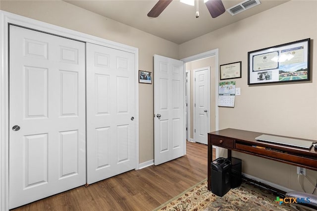 office area featuring hardwood / wood-style flooring and ceiling fan