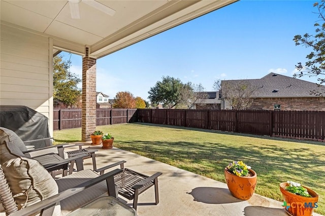 view of patio / terrace with ceiling fan and area for grilling