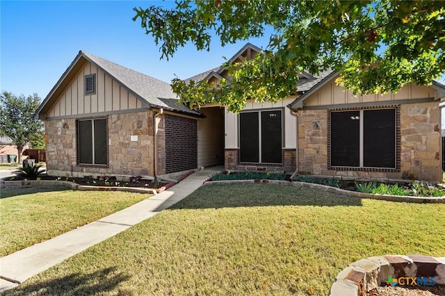 view of front of house with a front lawn