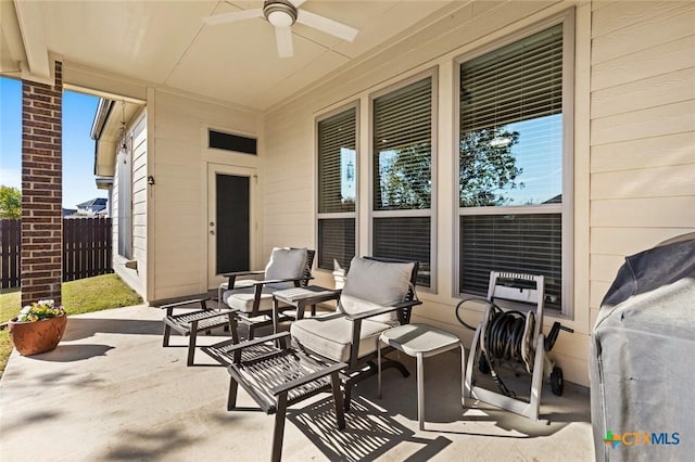 view of patio / terrace with ceiling fan and a grill