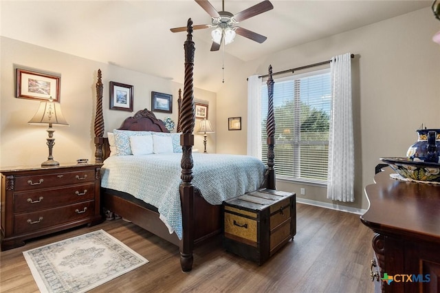 bedroom featuring hardwood / wood-style flooring and ceiling fan