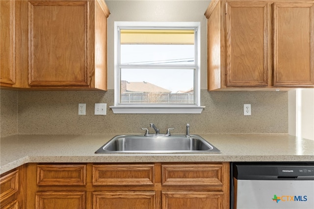 4612 Shawn Dr, Killeen, TX 76542 - kitchen with decorative backsplash, stainless steel dishwasher, and sink