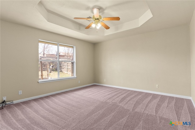 4612 Shawn Dr, Killeen, TX 76542 - carpeted spare room with a tray ceiling and ceiling fan