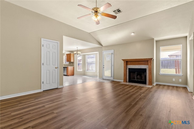 4612 Shawn Dr, Killeen, TX 76542 - unfurnished living room featuring a fireplace, hardwood / wood-style floors, and lofted ceiling