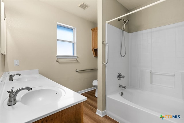 4612 Shawn Dr, Killeen, TX 76542 - full bathroom with hardwood / wood-style flooring, vanity, shower / bathtub combination, and toilet