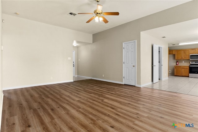 4612 Shawn Dr, Killeen, TX 76542 - unfurnished living room with light hardwood / wood-style flooring and ceiling fan